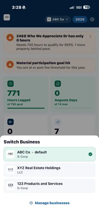 Switch Business panel listing an S-Corp marked default, a real estate LLC and a second S-Corp.